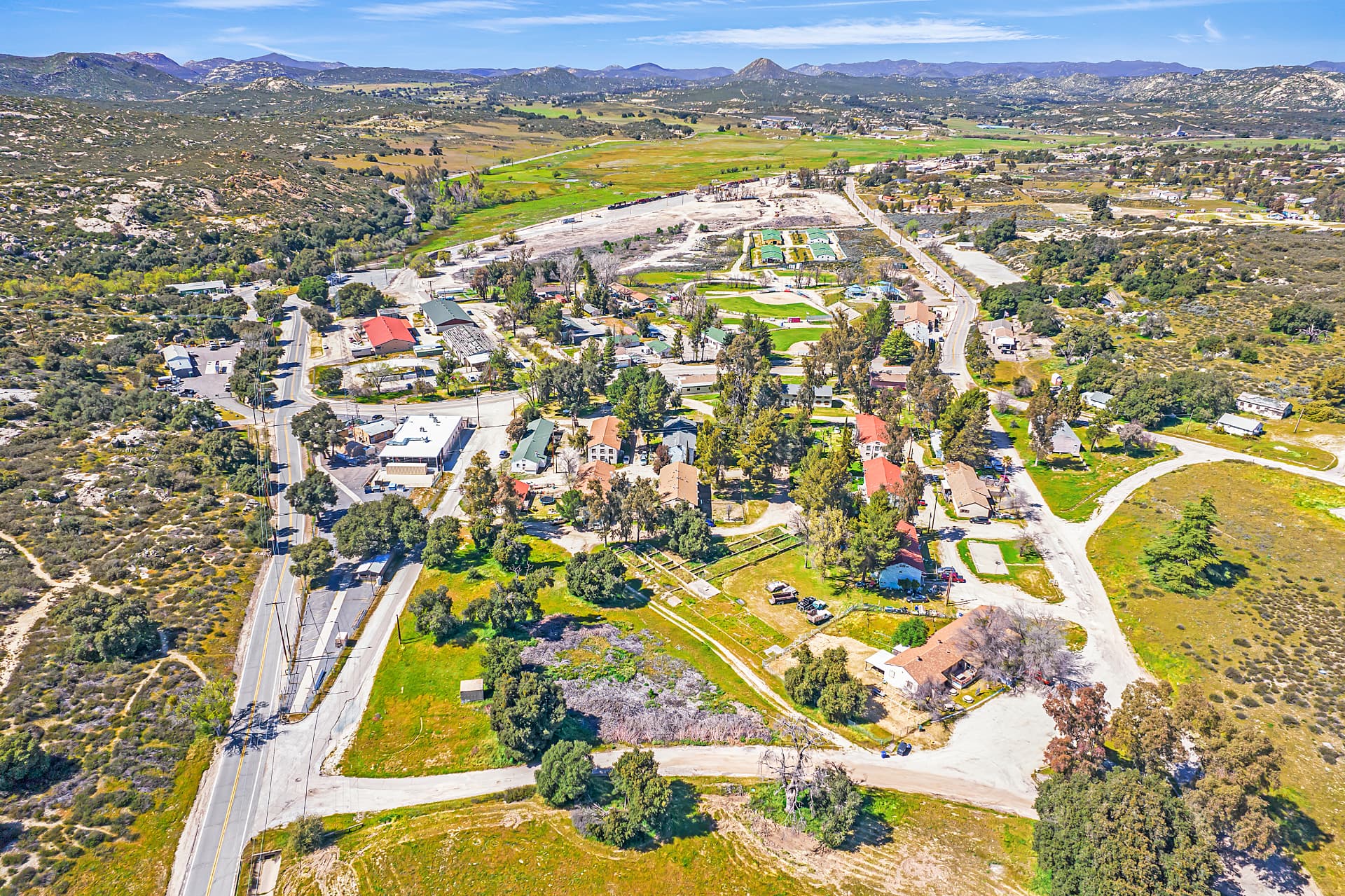 Aerial view of The Village of Campo, with rural roads, cottages, and the surrounding California desert